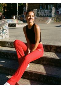 Sinsay - Spodnie flare z ozdobnymi rozcięciami - czerwony. Kolor: czerwony #1