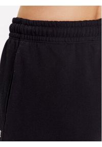 ROTATE Spodnie dresowe Mimi 700291100 Czarny Relaxed Fit. Kolor: czarny. Materiał: bawełna #4