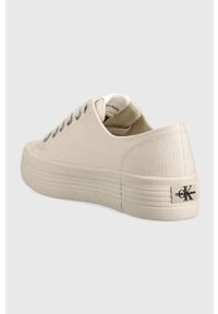 Calvin Klein Jeans tenisówki YW0YW00254.ACF damskie kolor beżowy. Nosek buta: okrągły. Zapięcie: sznurówki. Kolor: beżowy. Materiał: materiał, guma. Obcas: na platformie #3