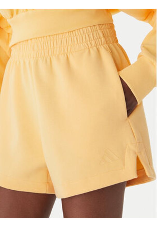 Adidas - adidas Szorty sportowe Soft Lux KA6998 Pomarańczowy Loose Fit. Kolor: pomarańczowy. Materiał: syntetyk