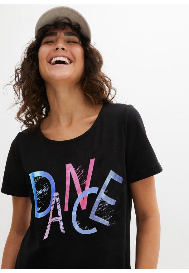bonprix - T-shirt z nadrukiem w stylu retro. Kolor: czarny. Wzór: nadruk. Styl: sportowy, retro