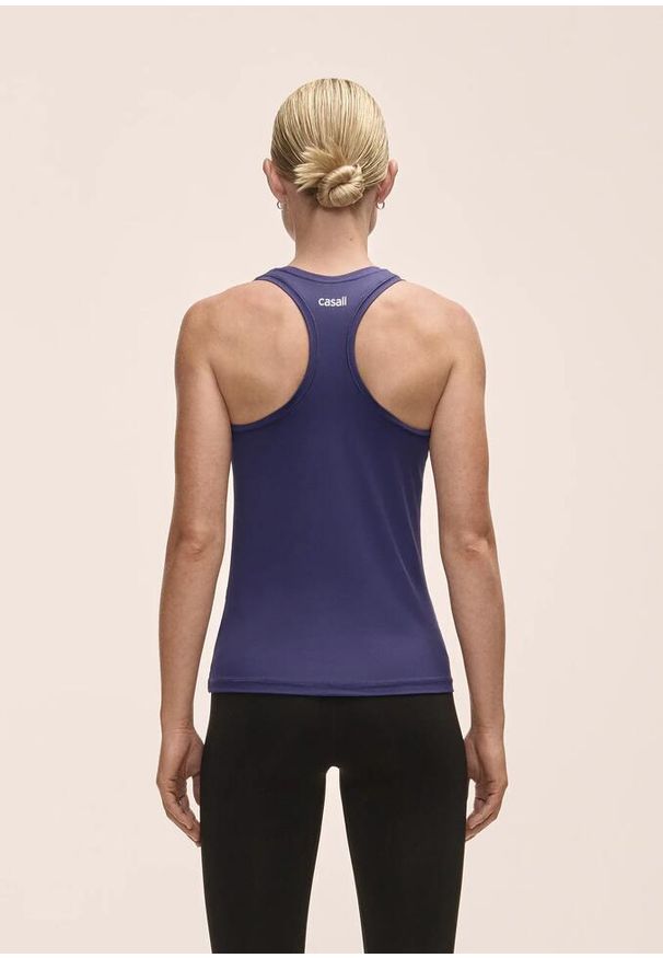 CASALL - Damska Koszulka Sportowa Treningowa Casall Essential Racerback Tank. Kolor: niebieski. Sport: joga i pilates