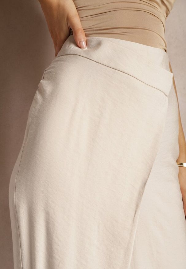 Renee - Jasnobeżowe Wiskozowe Spodnie High Waist z Szerokimi Nogawkami Nestali. Okazja: na co dzień. Stan: podwyższony. Kolor: beżowy. Materiał: wiskoza. Długość: długie. Styl: elegancki, casual