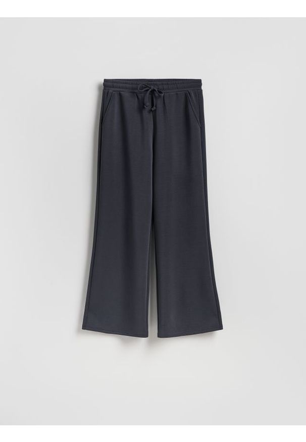 Reserved - Spodnie z szeroką nogawką - ciemnoszary. Kolor: szary. Materiał: dzianina