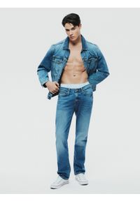Big-Star - Jeansy męskie z przetarciami niebieskie Terry 350. Stan: obniżony. Kolor: niebieski. Styl: elegancki