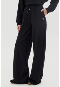 Guess - GUESS Czarne dresowe spodnie damskie Primula, Rozmiar XS. Kolor: czarny. Materiał: dresówka #1