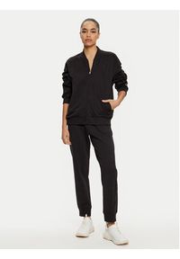 Champion Spodnie dresowe 117584 Czarny Slim Fit. Kolor: czarny. Materiał: bawełna