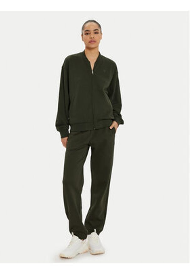 Champion Spodnie dresowe 117583 Zielony Regular Fit. Kolor: zielony. Materiał: bawełna