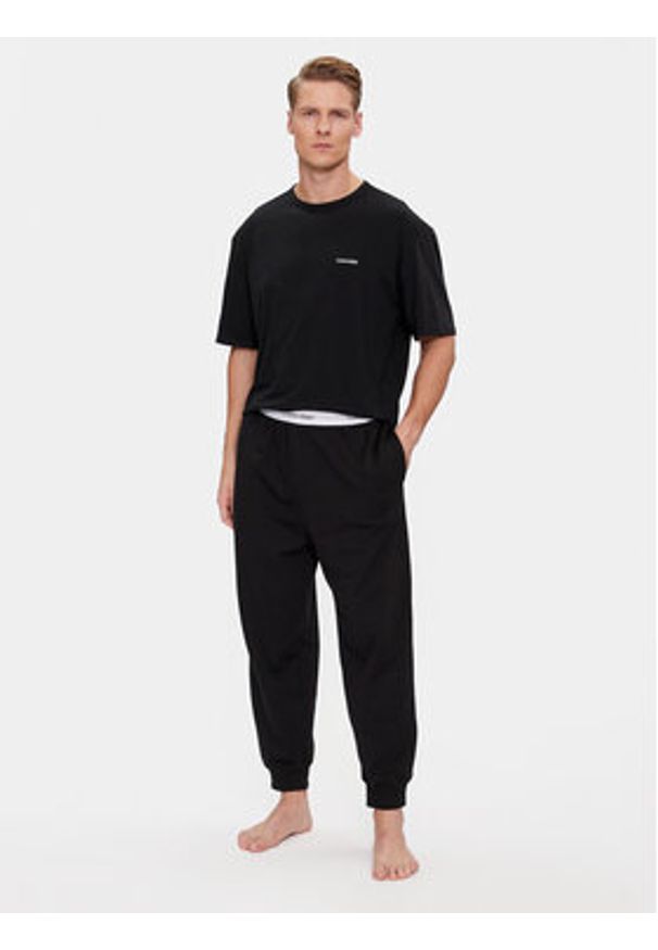 Calvin Klein Underwear Spodnie piżamowe 000NM2302E Czarny Regular Fit. Kolor: czarny. Materiał: syntetyk, bawełna