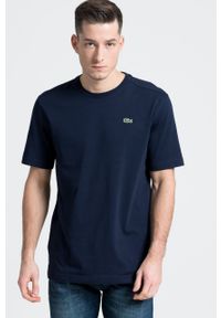 Lacoste T-shirt TH7618 kolor granatowy gładki TH7618-001. Okazja: na co dzień. Kolor: niebieski. Materiał: dzianina. Wzór: gładki. Styl: casual
