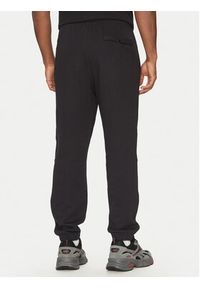 Reebok Spodnie dresowe 100214075 Czarny Regular Fit. Kolor: czarny. Materiał: bawełna #3