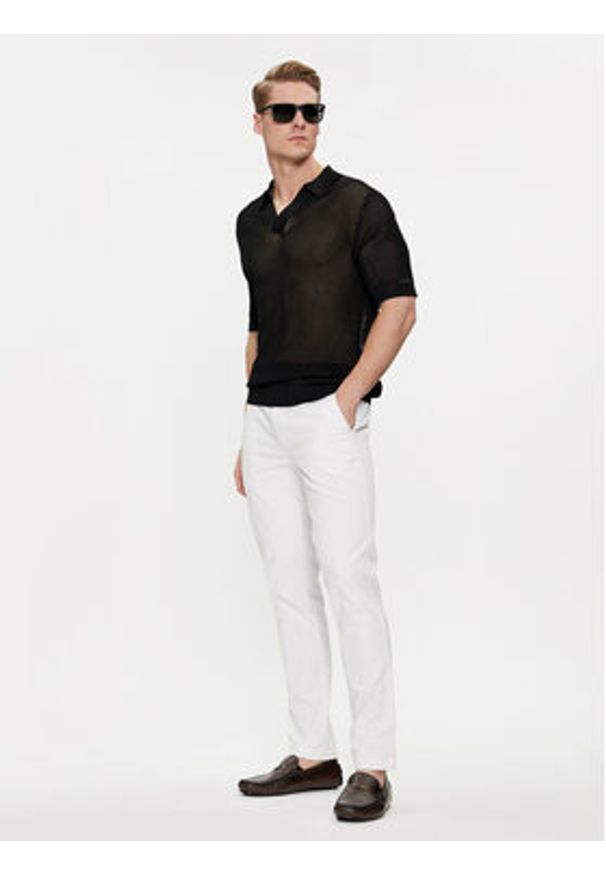 Calvin Klein Swimwear Polo KM0KM00963 Czarny Regular Fit. Typ kołnierza: polo. Kolor: czarny. Materiał: wiskoza, syntetyk