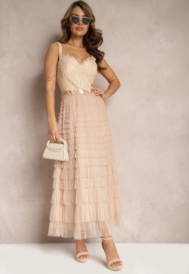 Renee - Beżowa Maxi Sukienka Rozkloszowana Sukienka na Ramiączkach z Gorsetową Górą Ocartia. Typ kołnierza: dekolt gorset. Kolor: beżowy. Długość rękawa: na ramiączkach. Typ sukienki: gorsetowe. Długość: maxi