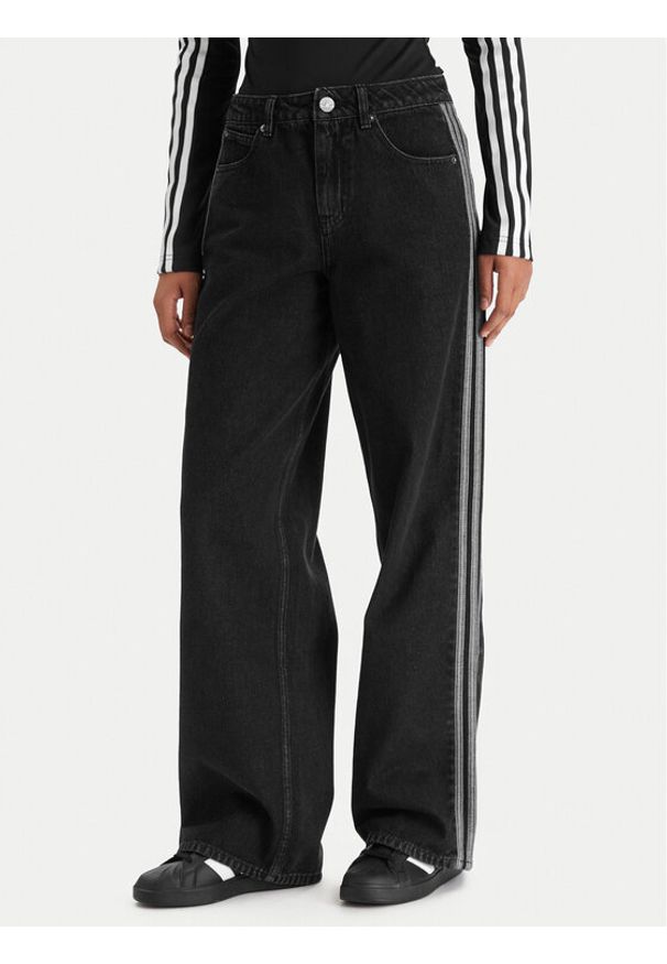 Adidas - adidas Jeansy Firebird KD2909 Czarny Regular Fit. Kolor: czarny