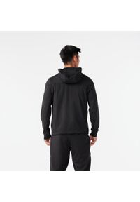KIPRUN - Bluza do biegania męska Kiprun Run 100 Warm ocieplana. Kolor: czarny. Materiał: tkanina, prążkowany, poliester, materiał, elastan. Sport: bieganie