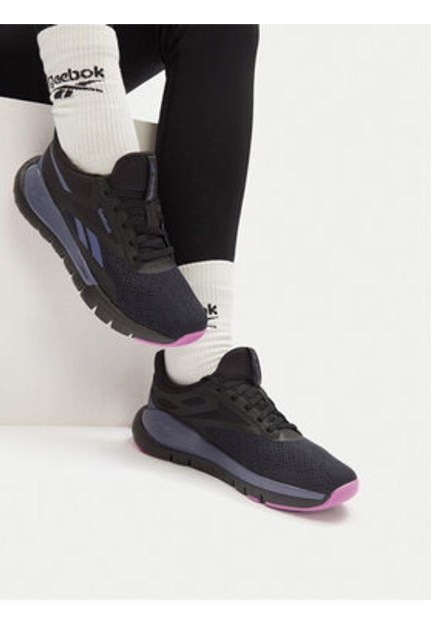 Reebok Buty halowe REEBOK FLEX TRAINER 100210154 Czarny. Kolor: czarny. Materiał: materiał