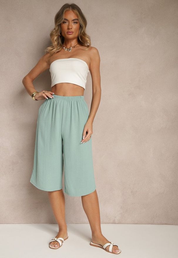 Renee - Jasnozielone Luźne Spodnie 3/4 z Kieszonkami Efrinea. Okazja: na co dzień. Kolor: zielony. Materiał: guma. Styl: elegancki, casual