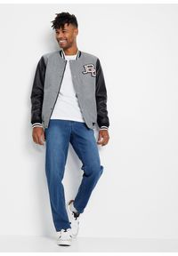 bonprix - "Dżinsy ""power-stretch""T-400, w wygodnym fasonie, Classic Fit Tapered". Kolor: niebieski