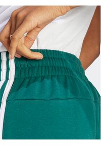 Adidas - adidas Spodnie dresowe Essentials 3-Stripes French Terry Loose-Fit Joggers IL3448 Zielony Loose Fit. Kolor: zielony. Materiał: bawełna #6