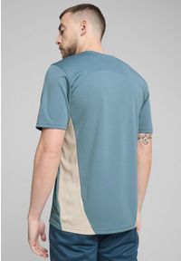 Puma - Koszulka treningowa OM 2024/25. Kolor: wielokolorowy, beżowy, niebieski. Materiał: materiał