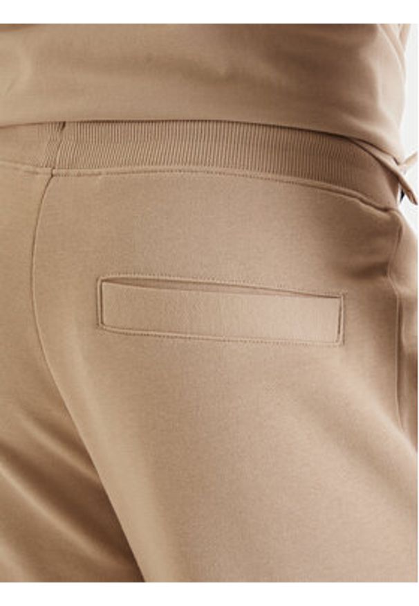 Hugo - HUGO Spodnie dresowe Doak212 50447963 Beżowy Regular Fit. Kolor: beżowy. Materiał: bawełna