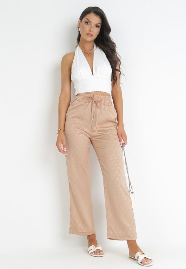 Born2be - Ciemnobeżowe Szerokie Spodnie z Gumką w Pasie Moti. Stan: podwyższony. Kolor: beżowy