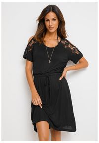 bonprix - Prześwitująca sukienka plażowa. Okazja: na plażę. Kolor: czarny. Materiał: koronka. Wzór: koronka #1