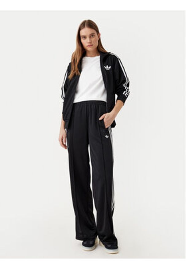 Adidas - adidas Spodnie dresowe adicolor Classic Firebird JC8245 Czarny Loose Fit. Kolor: czarny. Materiał: syntetyk