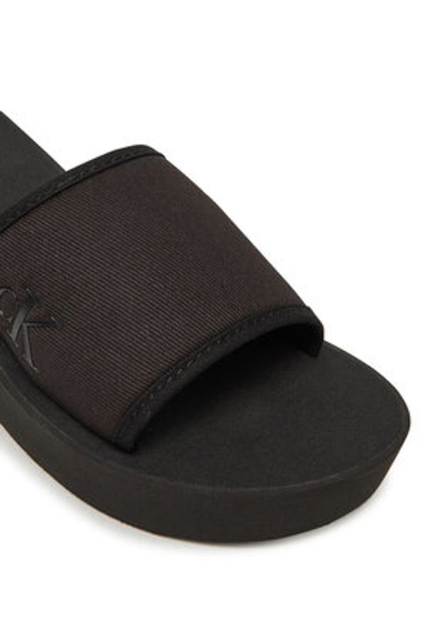 Calvin Klein Jeans Klapki Beach Wedge Slide Canvas YW0YW01725 Czarny. Kolor: czarny. Materiał: materiał
