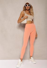 Renee - Pomarańczowe Sportowe Legginsy High Waist Quarefia. Stan: podwyższony. Kolor: pomarańczowy. Materiał: dzianina. Styl: sportowy #2