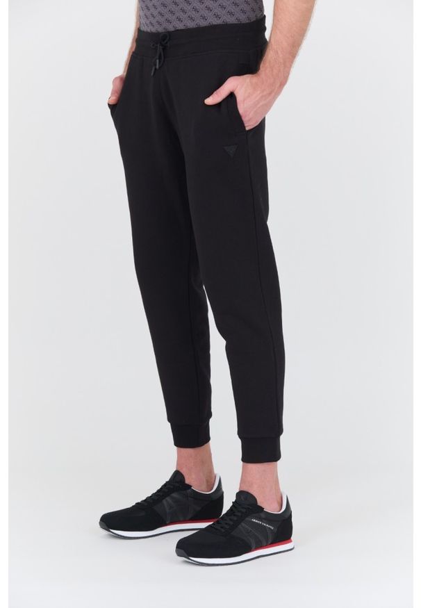 Guess - GUESS Czarne męskie spodnie dresowe Aldwin, Rozmiar XXL. Kolor: czarny. Materiał: dresówka