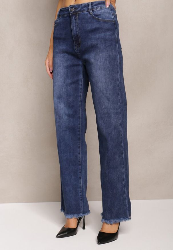Renee - Granatowe Szerokie Jeansy z Postrzępionymi Nogawkami Orimske. Kolor: niebieski