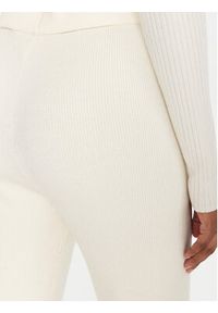 Guess Legginsy V5BB08 Z3JD2 Écru Flare Fit. Materiał: syntetyk