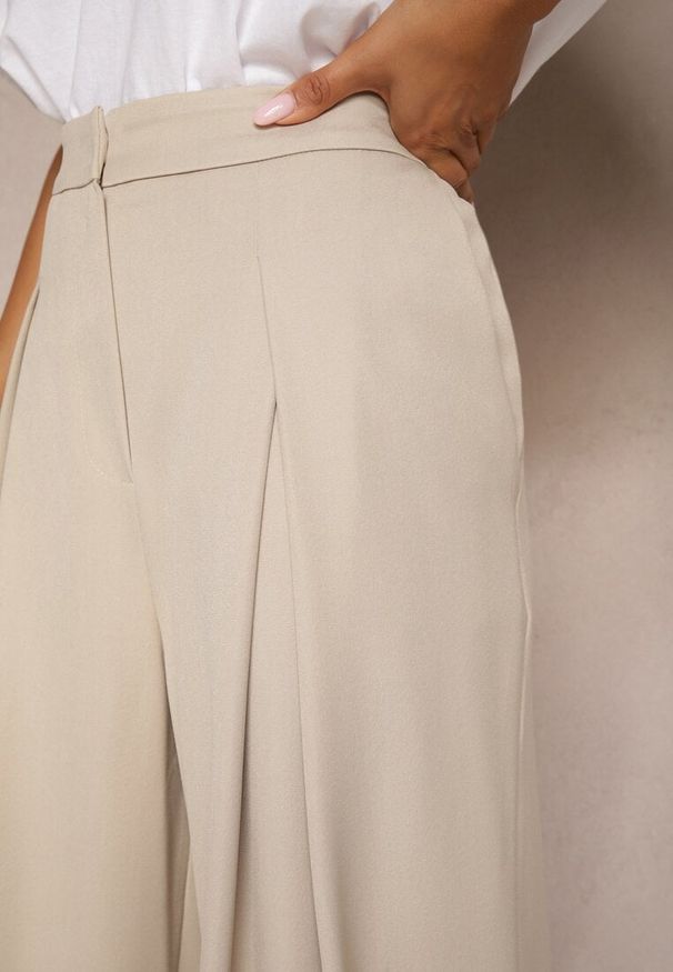 Renee - Beżowe Szerokie Spodnie z Wiskozą o Garniturowym Kroju z Zakładkami i Kieszeniami Lobine. Okazja: na co dzień. Kolor: beżowy. Materiał: wiskoza. Styl: casual, elegancki