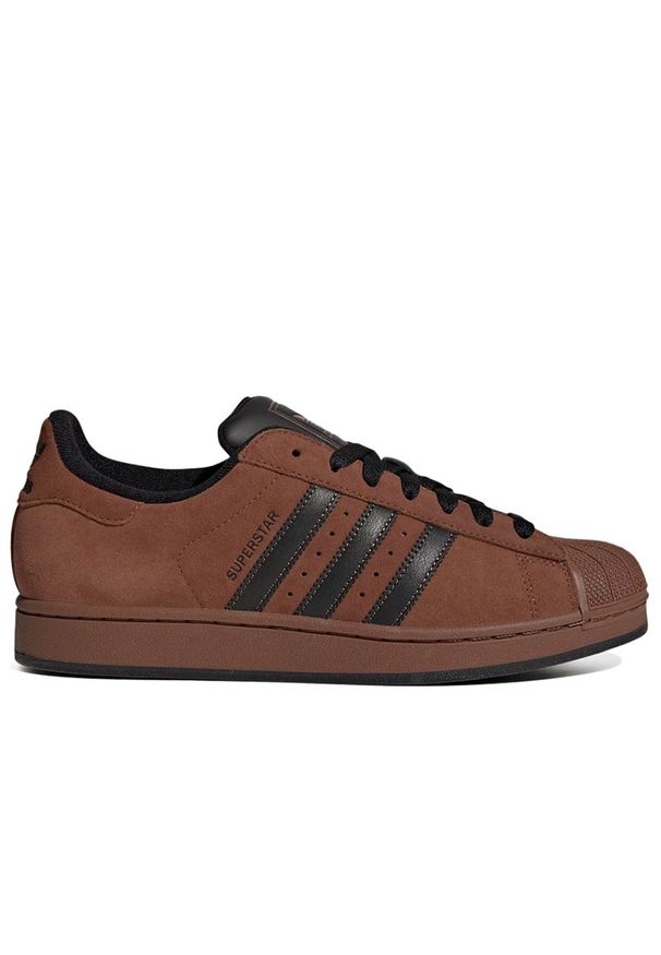 Adidas - Buty unisex adidas Originals Superstar II IH9318 - brązowe. Zapięcie: pasek. Kolor: brązowy. Materiał: zamsz, guma, skóra. Szerokość cholewki: normalna. Wzór: aplikacja. Sezon: lato. Model: Adidas Superstar