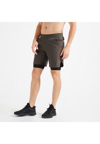 DOMYOS - Spodenki fitness cardio męskie Domyos 2 w 1. Kolor: zielony, brązowy, wielokolorowy. Materiał: materiał, skóra, elastan, poliester. Długość: krótkie. Sport: fitness
