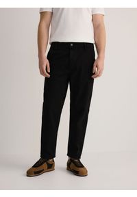 Reserved - Jeansy carrot fit - czarny. Kolor: czarny