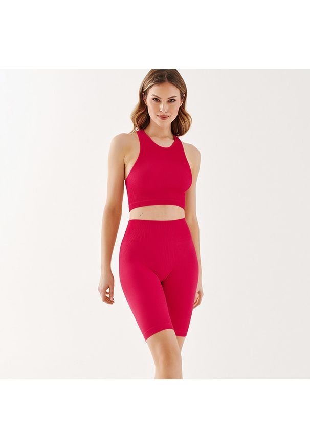 Gabriella - Bezszwowy top damski z dekoltem halter rib raspberry. Okazja: na co dzień. Typ kołnierza: dekolt halter. Kolor: różowy. Materiał: prążkowany, dzianina, poliamid, mikrofibra, włókno, elastan. Styl: sportowy, casual
