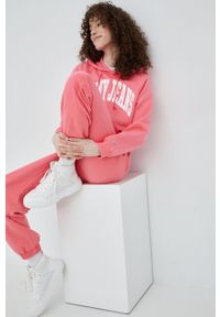 Tommy Jeans spodnie DW0DW11886.PPYY damskie kolor różowy gładkie. Kolor: różowy. Materiał: materiał, dzianina. Wzór: gładki #5