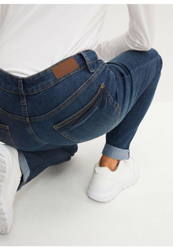 bonprix - Dżinsy ze stretchem straight, mid waist. Kolor: niebieski