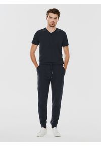 Pako Lorente - Dzianinowe spodnie dresowe w granatowym kolorze. Okazja: na co dzień. Kolor: niebieski. Materiał: dresówka, dzianina. Wzór: gładki. Styl: casual #3