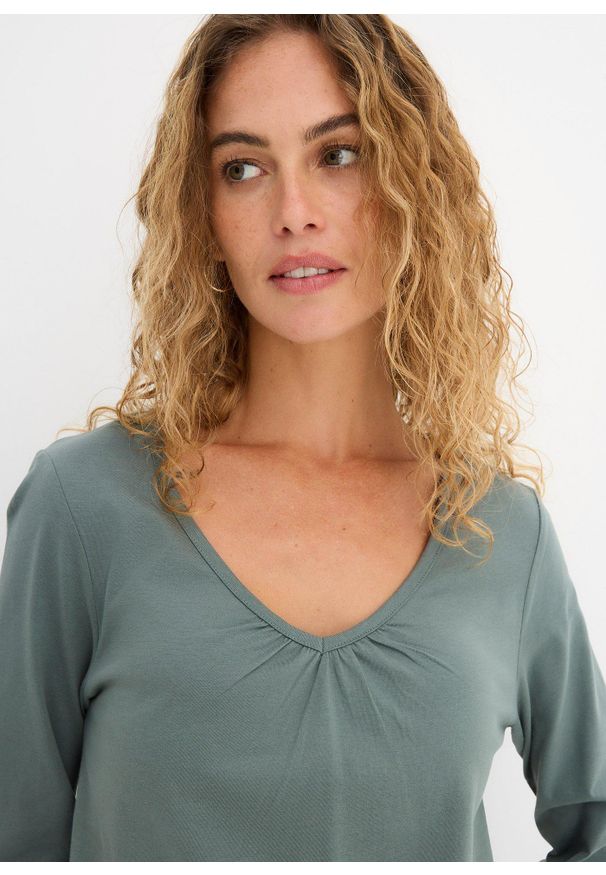bonprix - Bluzka bawełniana z czystej bawełny z długim rękawem i gumką. Typ kołnierza: dekolt w serek. Kolor: zielony. Materiał: bawełna. Długość rękawa: długi rękaw. Długość: długie