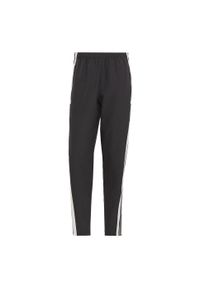Adidas - Spodnie męskie adidas Squadra 21 Presentation Pants. Kolor: czarny, biały, wielokolorowy. Sport: piłka nożna