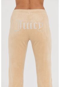 Juicy Couture - JUICY COUTURE Beżowe spodnie dresowe Tina Track Pants. Kolor: beżowy. Materiał: dresówka