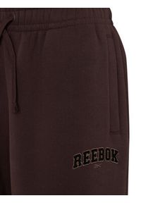 Reebok Spodnie dresowe Iza RK25687CCW Brązowy ciemny Regular Fit. Kolor: brązowy. Materiał: bawełna #5