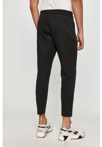 Calvin Klein - Spodnie. Kolor: czarny. Materiał: bawełna, poliester, dzianina, elastan. Wzór: gładki #3