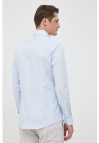 Calvin Klein koszula męska slim z kołnierzykiem klasycznym. Typ kołnierza: kołnierzyk klasyczny. Kolor: niebieski. Materiał: tkanina, bawełna. Długość rękawa: długi rękaw. Długość: długie. Wzór: gładki. Styl: klasyczny #3