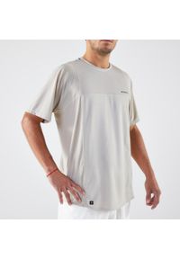 ARTENGO - Koszulka tenisowa męska krótki rękaw Artengo Dry Gaël Monfils. Kolor: beżowy. Materiał: materiał, elastan. Długość rękawa: krótki rękaw. Długość: krótkie. Sport: tenis