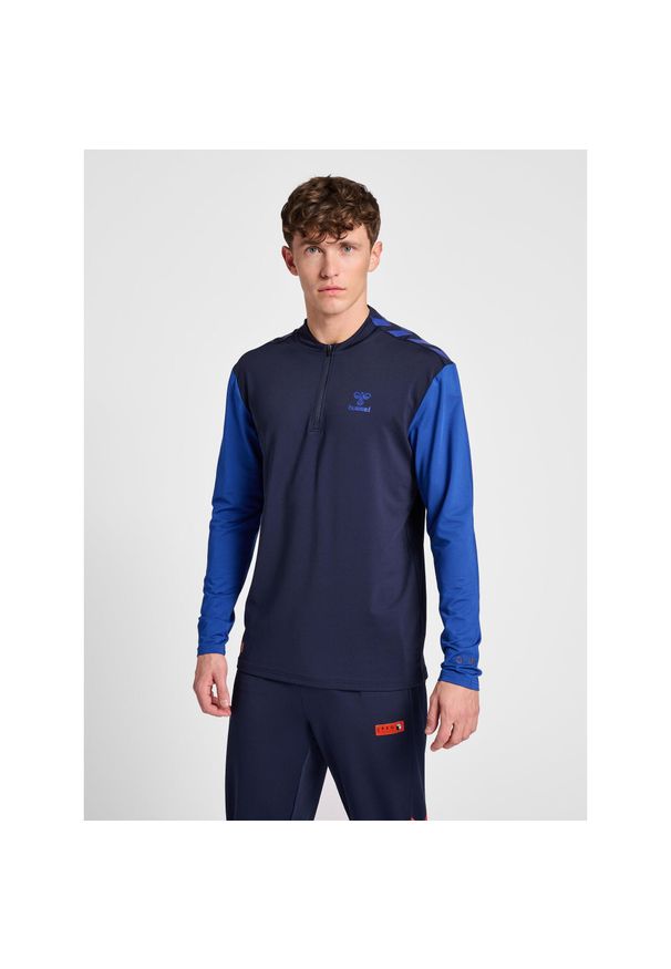 Bluza dresowa 1/2 zip Hummel Pro Grid. Kolor: niebieski. Materiał: dresówka. Sport: piłka ręczna