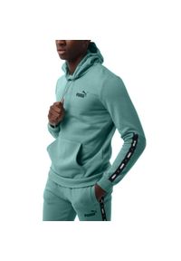 Puma - Bluza męska z kapturem PUMA PUMA ESS+ Tape Hoodie. Typ kołnierza: kaptur. Kolor: zielony